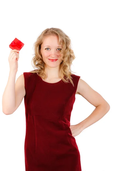 Beautiful blonde woman holding red gift box — Stock Photo, Image