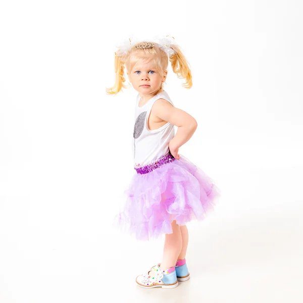 Blonde girl standing on white background — Stock Photo, Image