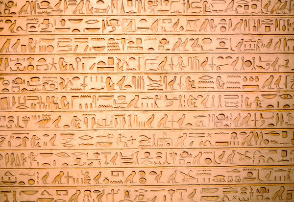 Egyptian hieroglyphs on the wall