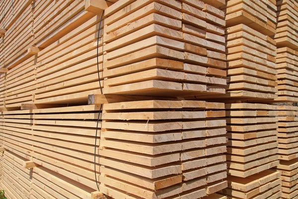 Stack of new wooden studs — Stock Photo, Image