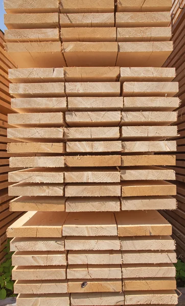 Stack of new wooden studs — Stock Photo, Image