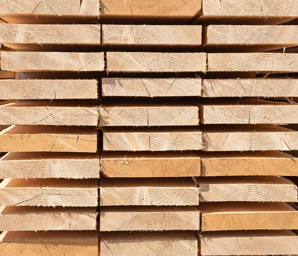 Stack of new wooden studs — Stock Photo, Image