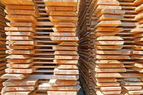 Stack of new wooden studs — Stock Photo, Image