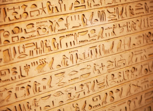 Egyptian hieroglyphs on the wall Royalty Free Stock Photos