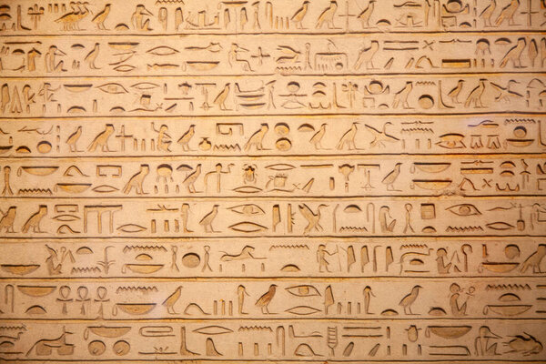 Egyptian hieroglyphs on the wall