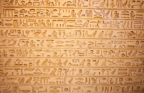 Egyptian hieroglyphs on the wall