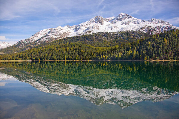 Maloja region - collection of beatiful lakes, mountains and road connecting Switzerland and Ital