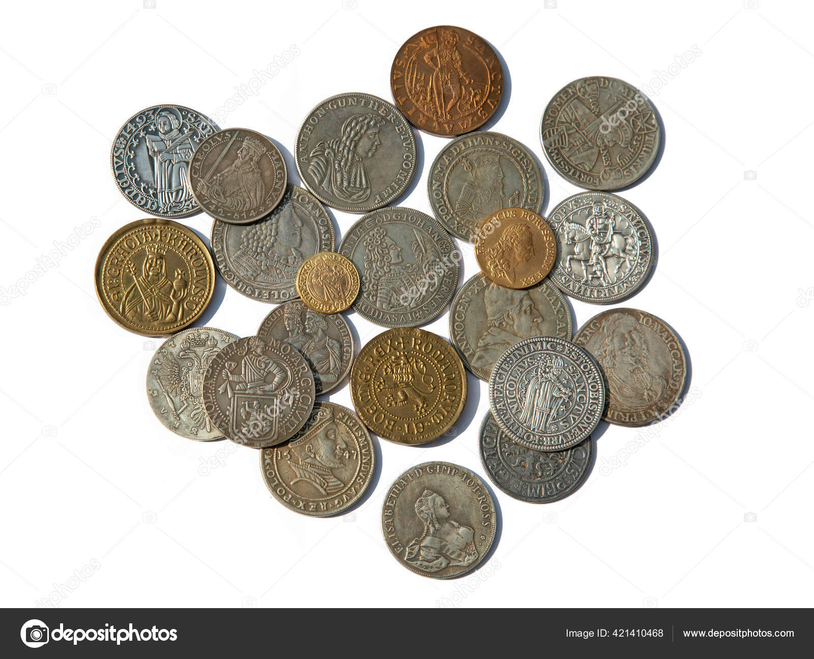 白色背景的中世纪硬币的收藏品——图库图片© swisshippo #421410468