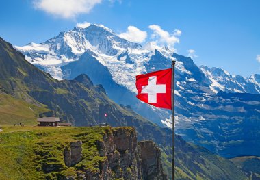 Swiss flag on the top of Mannlichen clipart