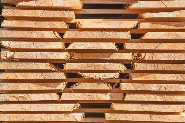Stack of new wooden studs — Stock Photo, Image