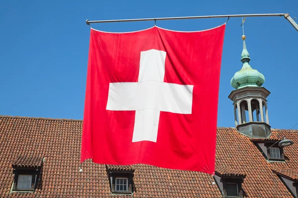 Schweiziska flaggan närbild — Stockfoto