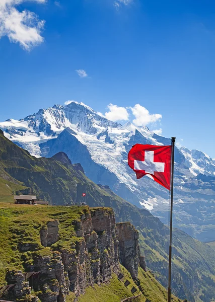 Schweizer Flagge auf dem Gipfel des Mannlichen — Stockfoto