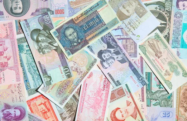 Mängd olika asiatiska sedlar — Stockfoto