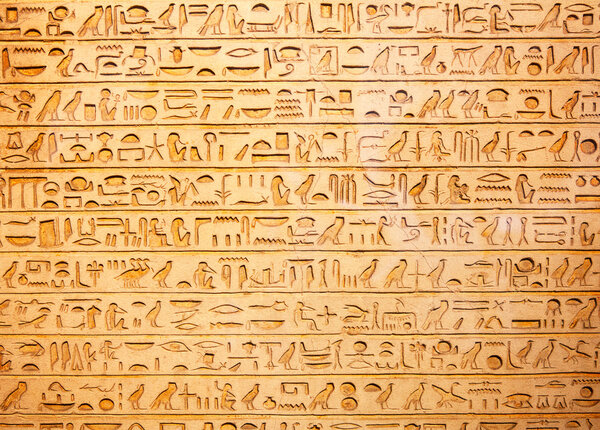 Egyptian hieroglyphs on the wall