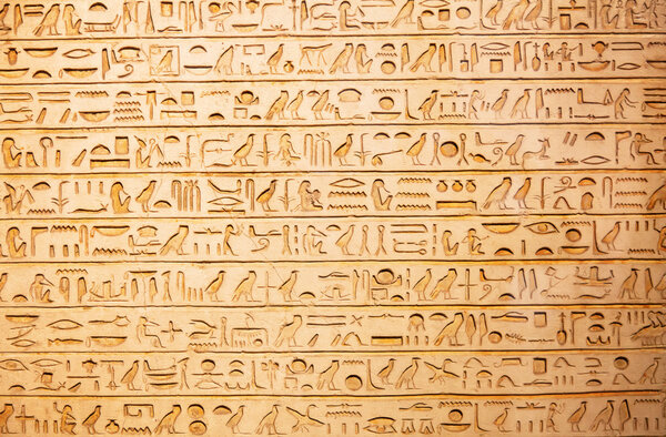 Egyptian hieroglyphs on the wall