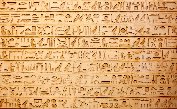 Egyptian hieroglyphs on the wall Royalty Free Stock Images