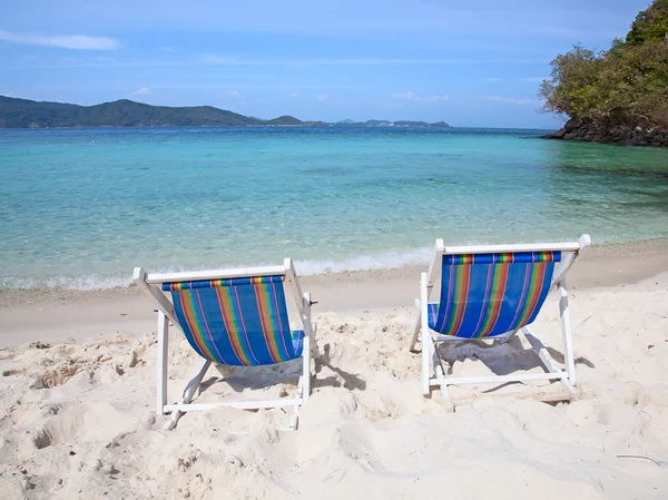 Chairs on sandy beach — Stock Photo, Image