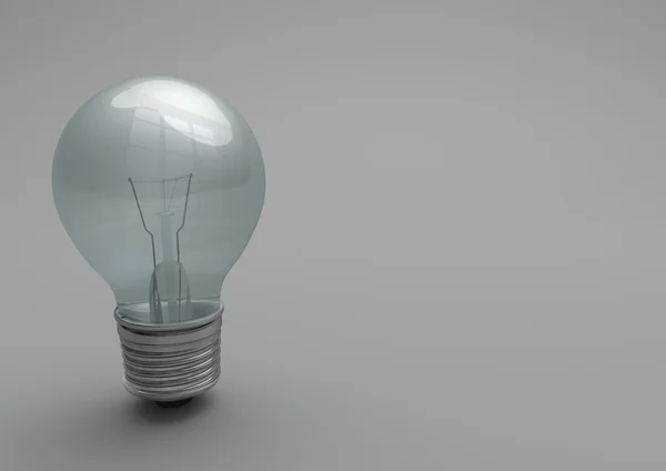 Glödlampa på grå bakgrund — Stockfoto