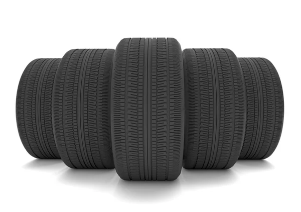 Cinco pneus no fundo branco . — Fotografia de Stock