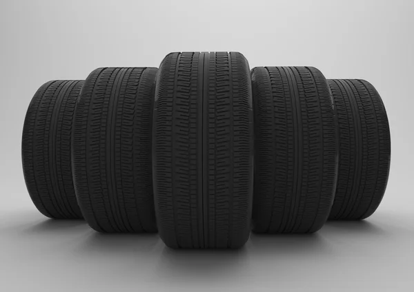 Fünf Reifen auf grau — Stockfoto