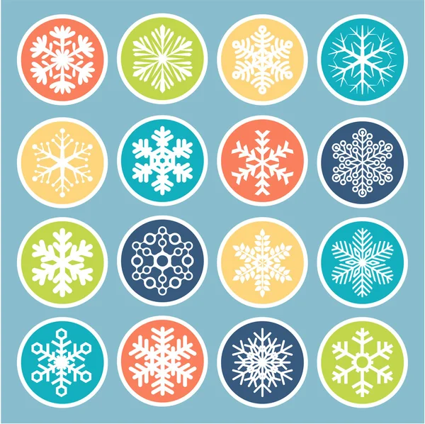 Flocons de neige vectoriels colorés . — Image vectorielle