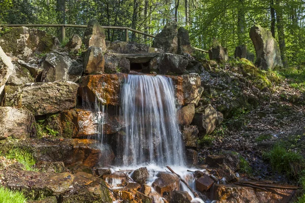 Waterfall at the casino park in spring, Georgsmarienhuette, Osnabrueck country, Lower Saxony, Germany — Stock Photo, Image