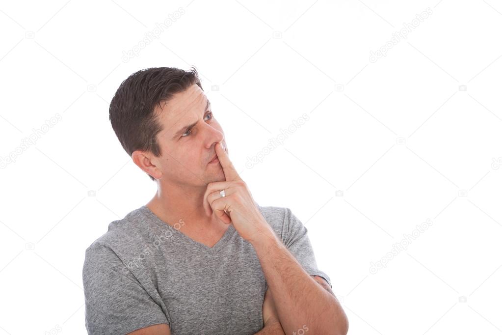Middle Age Man Thinking with Finger on Lips