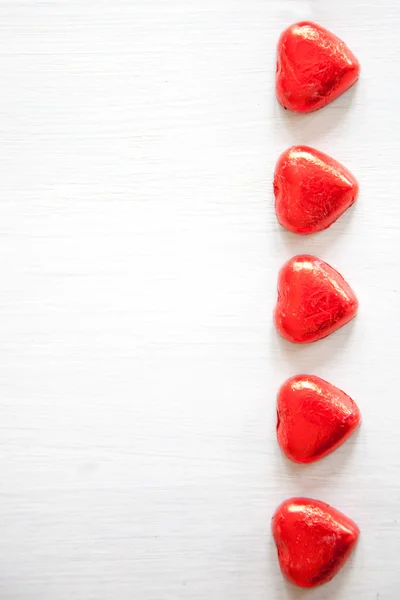 Valentijnsdag achtergrond met harten. — Stockfoto