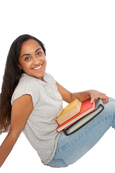 Chica india feliz con libros sentados en el suelo —  Fotos de Stock