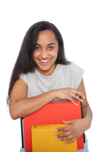 De cerca la joven feliz apoyada en sus libros — Foto de Stock