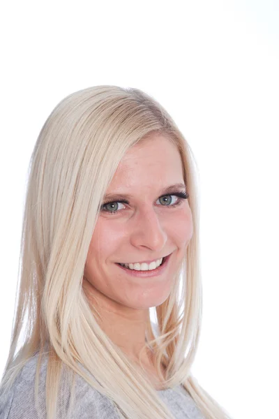 Portret van glimlachen blonde vrouw in witte Studio — Stockfoto