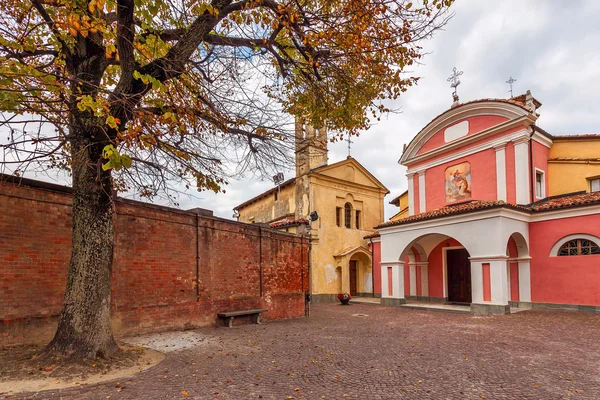 Two churches on small town sqyare. — Stock Photo, Image