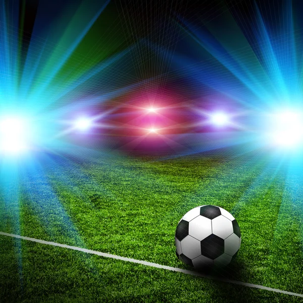 Fotbalový míč na zelené louce — Stock fotografie
