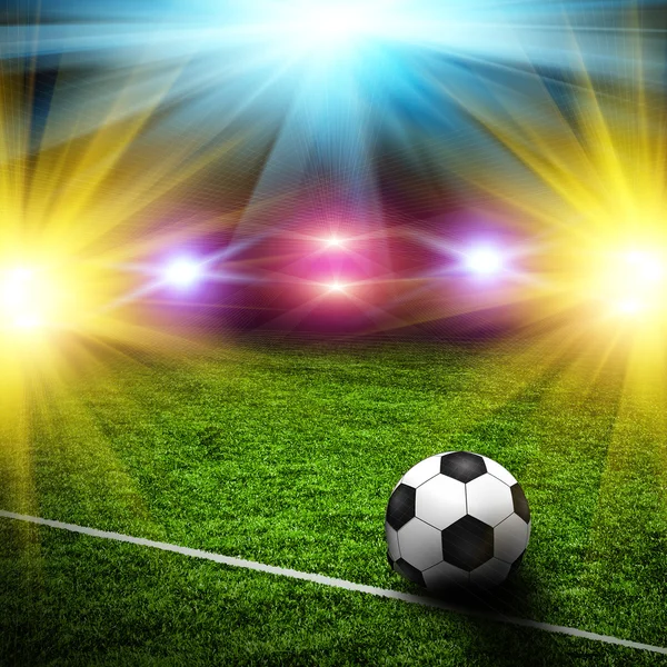 Soccer ball on the green field — Stock Photo, Image