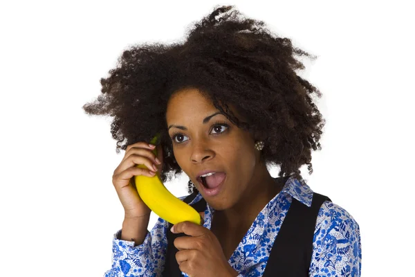 Жінка афроамериканка з бананом — стокове фото