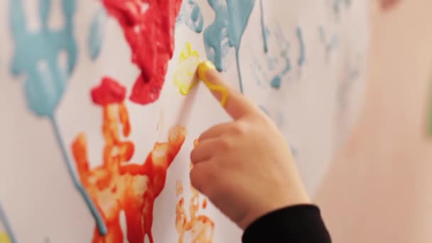 Children Painting White Paper Using Fingers — Stock Video