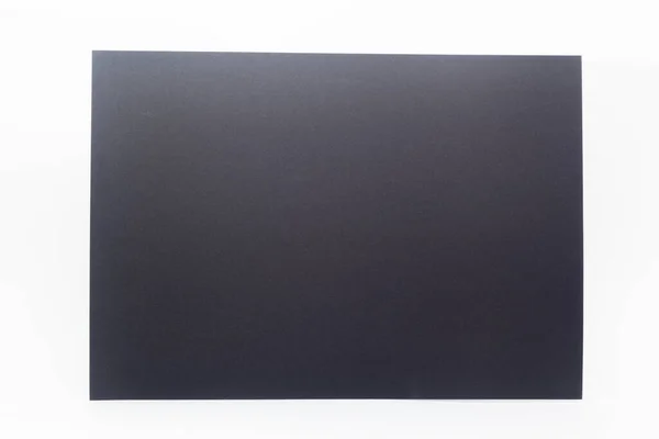 Closeup Black Paper Sheet White Background Stock Image