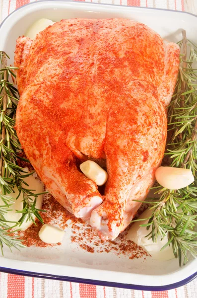 Whole chicken prepared with a paprika marinade — Stock Photo, Image