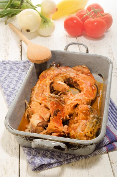 Boiled carp in a gray metal cooking tin — Stock Photo, Image