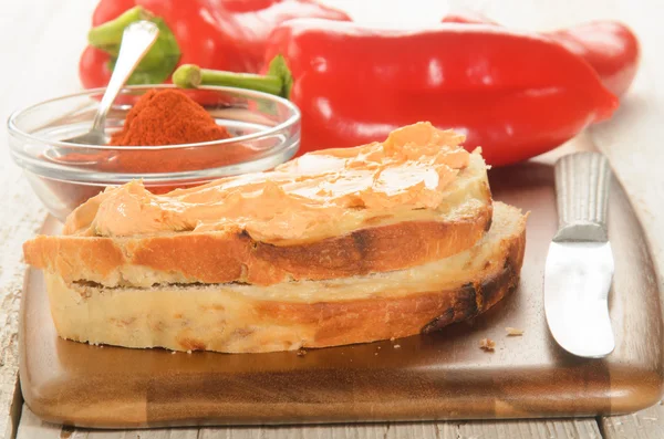 Paprika spread on a slice of bread — Stock Photo, Image