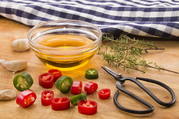 Thyme with chili, garlic and olive oil — Stock Photo, Image