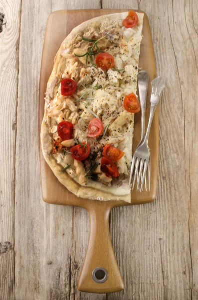 Tarte flambee with cod and tomato — Stock Photo, Image