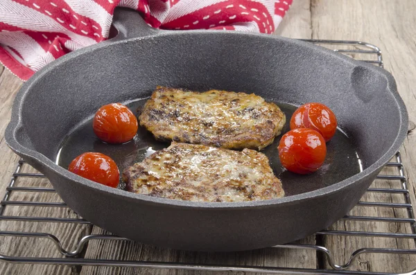 Black pudding boxty in a pan — Stock Photo, Image