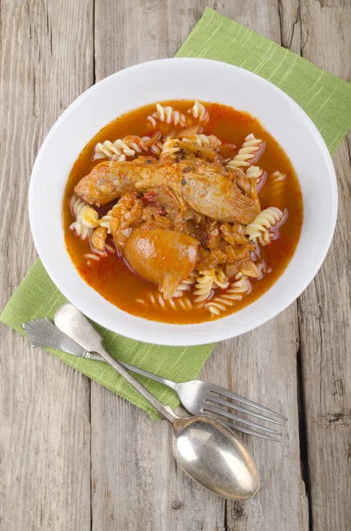 Warm paprika thighs with noodle — Stock Photo, Image