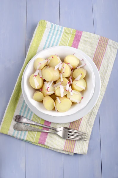 Organic baby potatoes chopped radish — Stock Photo, Image
