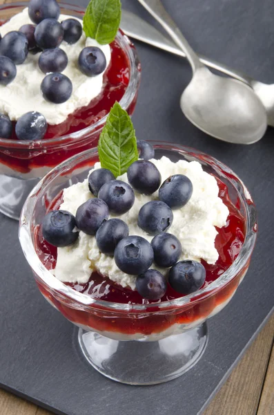 Strawberry dessert with  blueberries and whipped cream — Stock Photo, Image