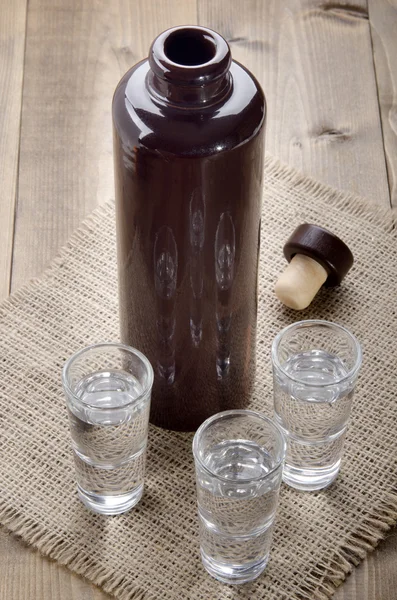 Juniper brandy in small glasses — Stock Photo, Image