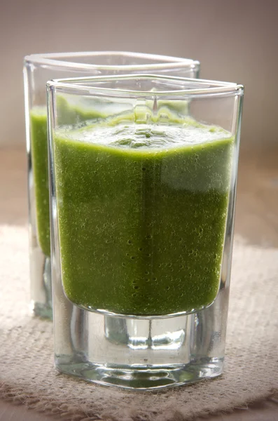 Green smoothie in a shot glass — Stock Photo, Image