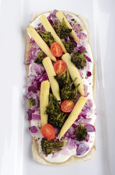 Vegetarian tarte flambee on a plate — Stock Photo, Image