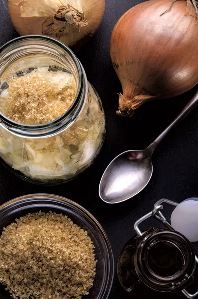 Onions and brown sugar to make juice — Stock Photo, Image